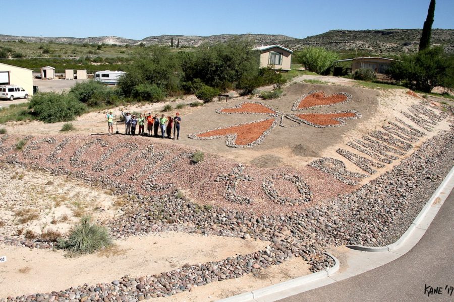 Welcome to Rainbow Acres! Our Ranchers, adults with developmental disabilities stand by their newly built sign in Verde Valley, AZ