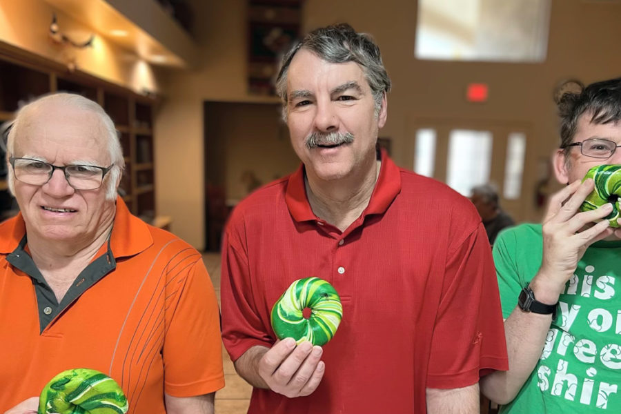 The gentlemen show off their breakfast beagles for St Patrick's Day in their house at Rainbow Acres.