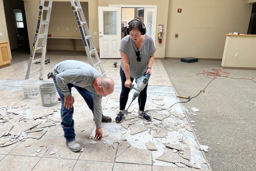 A mission team volunteering at Rainbow Acres, helping with renovations in one of the homes